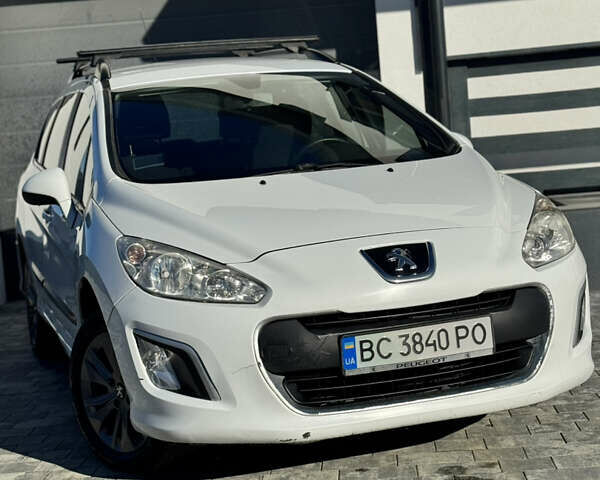 Белый Пежо 308, объемом двигателя 1.6 л и пробегом 220 тыс. км за 5500 $, фото 6 на Automoto.ua
