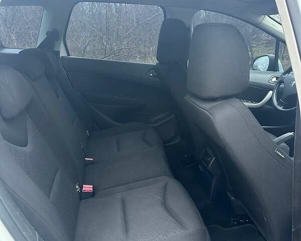 Белый Пежо 308, объемом двигателя 1.56 л и пробегом 226 тыс. км за 5100 $, фото 7 на Automoto.ua