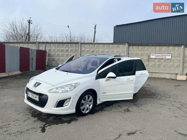 Белый Пежо 308, объемом двигателя 1.56 л и пробегом 151 тыс. км за 7500 $, фото 15 на Automoto.ua