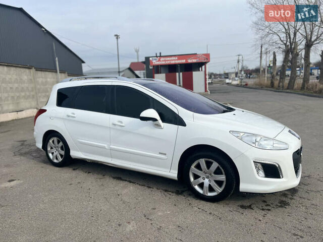 Белый Пежо 308, объемом двигателя 1.56 л и пробегом 151 тыс. км за 7500 $, фото 9 на Automoto.ua
