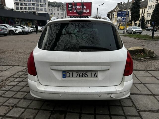Білий Пежо 308, об'ємом двигуна 1.6 л та пробігом 254 тис. км за 4799 $, фото 4 на Automoto.ua