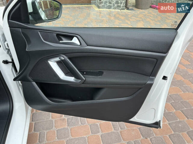 Пежо 308 2014 в Житомире на Automoto.ua Белый Пежо 308, объемом двигателя 1.56 л и пробегом 195 тыс. км за 9200 $, фото 39 на Automoto.ua