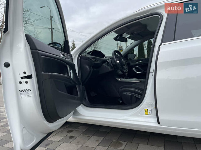 Белый Пежо 308, объемом двигателя 2 л и пробегом 234 тыс. км за 11750 $, фото 46 на Automoto.ua