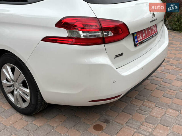 Пежо 308 2014 в Житомире на Automoto.ua Белый Пежо 308, объемом двигателя 1.56 л и пробегом 195 тыс. км за 9200 $, фото 16 на Automoto.ua