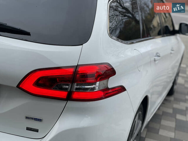 Білий Пежо 308, об'ємом двигуна 2 л та пробігом 234 тис. км за 11750 $, фото 16 на Automoto.ua