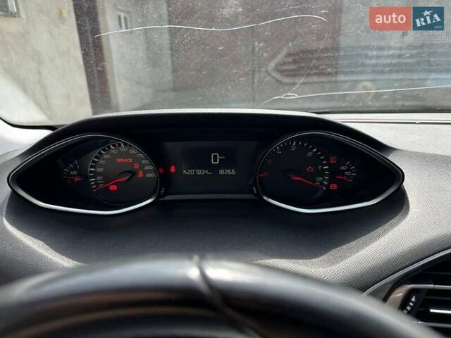 Белый Пежо 308, объемом двигателя 1.56 л и пробегом 207 тыс. км за 9100 $, фото 24 на Automoto.ua