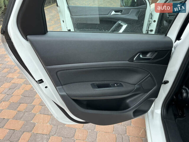 Пежо 308 2014 в Житомире на Automoto.ua Белый Пежо 308, объемом двигателя 1.56 л и пробегом 195 тыс. км за 9200 $, фото 32 на Automoto.ua