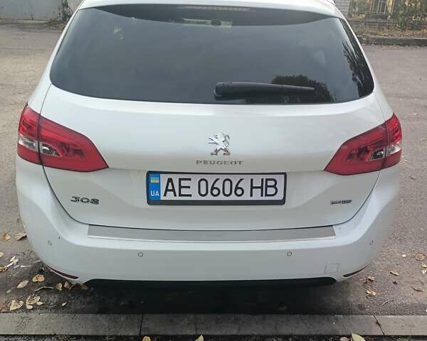 Белый Пежо 308, объемом двигателя 1.56 л и пробегом 200 тыс. км за 9500 $, фото 2 на Automoto.ua