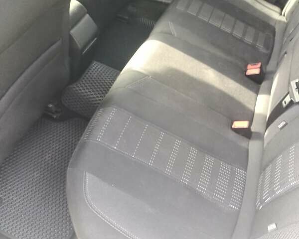 Белый Пежо 308, объемом двигателя 1.56 л и пробегом 200 тыс. км за 9500 $, фото 8 на Automoto.ua