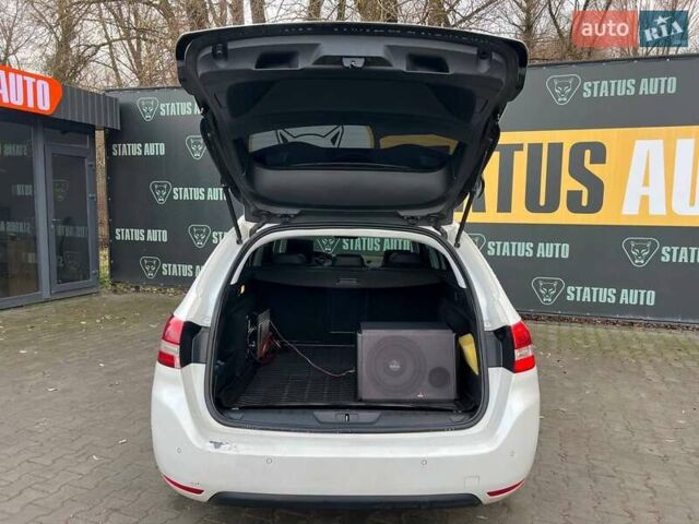 Белый Пежо 308, объемом двигателя 1.56 л и пробегом 265 тыс. км за 11000 $, фото 9 на Automoto.ua