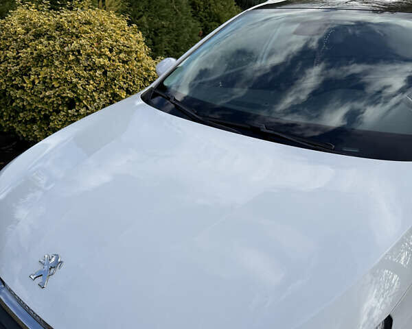 Белый Пежо 308, объемом двигателя 1.56 л и пробегом 274 тыс. км за 9400 $, фото 66 на Automoto.ua