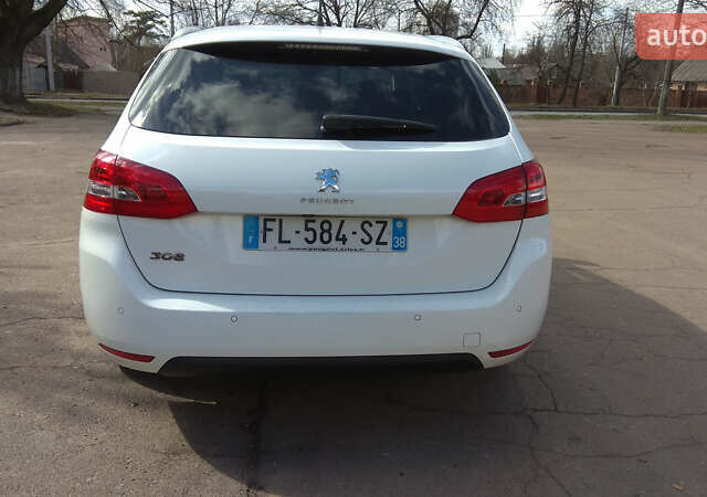 Білий Пежо 308, об'ємом двигуна 1.5 л та пробігом 220 тис. км за 10990 $, фото 5 на Automoto.ua