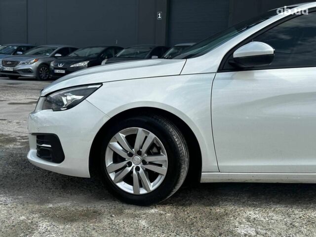 Белый Пежо 308, объемом двигателя 1.5 л и пробегом 206 тыс. км за 12640 $, фото 4 на Automoto.ua