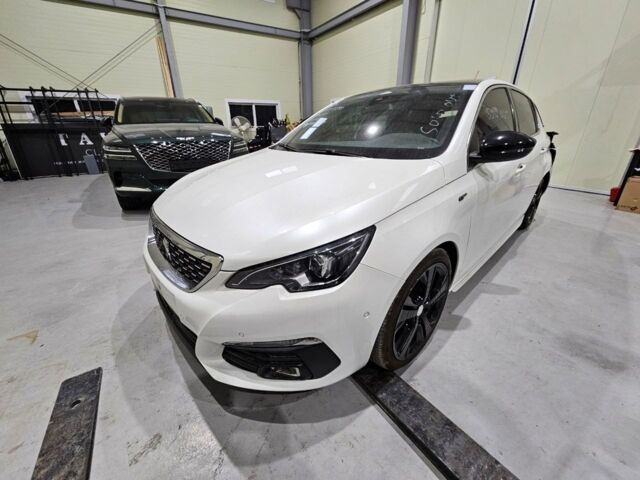 Белый Пежо 308, объемом двигателя 2 л и пробегом 43 тыс. км за 12600 $, фото 1 на Automoto.ua
