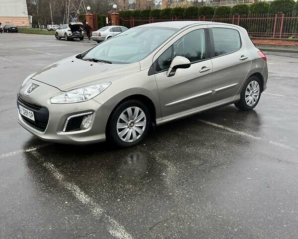 Бежевый Пежо 308, объемом двигателя 1.6 л и пробегом 246 тыс. км за 5900 $, фото 1 на Automoto.ua