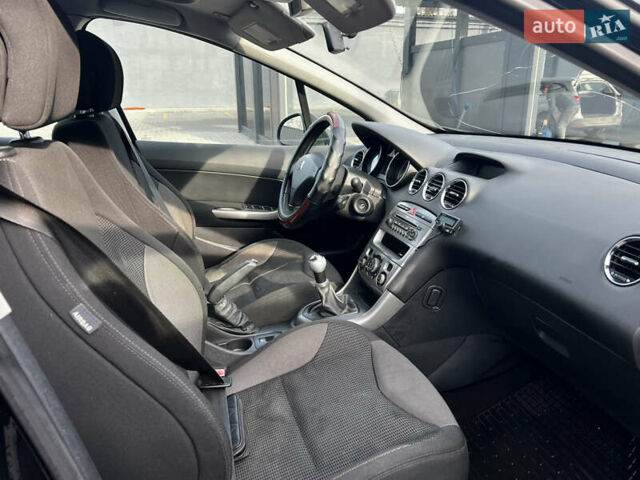 Черный Пежо 308, объемом двигателя 1.6 л и пробегом 260 тыс. км за 4600 $, фото 11 на Automoto.ua