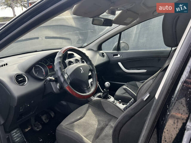 Черный Пежо 308, объемом двигателя 1.6 л и пробегом 260 тыс. км за 4600 $, фото 10 на Automoto.ua