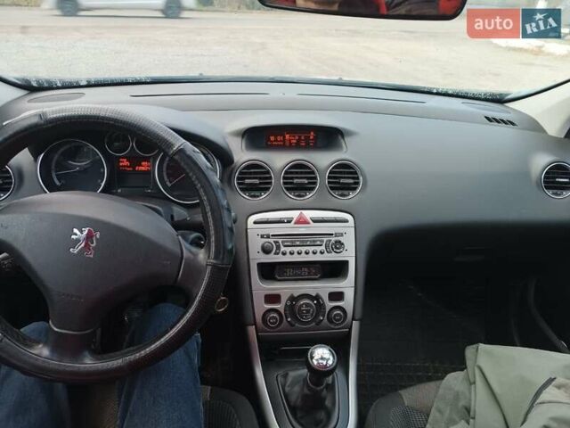 Черный Пежо 308, объемом двигателя 1.6 л и пробегом 240 тыс. км за 6200 $, фото 2 на Automoto.ua