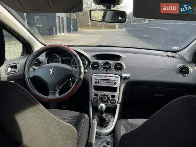 Черный Пежо 308, объемом двигателя 1.6 л и пробегом 260 тыс. км за 4600 $, фото 15 на Automoto.ua
