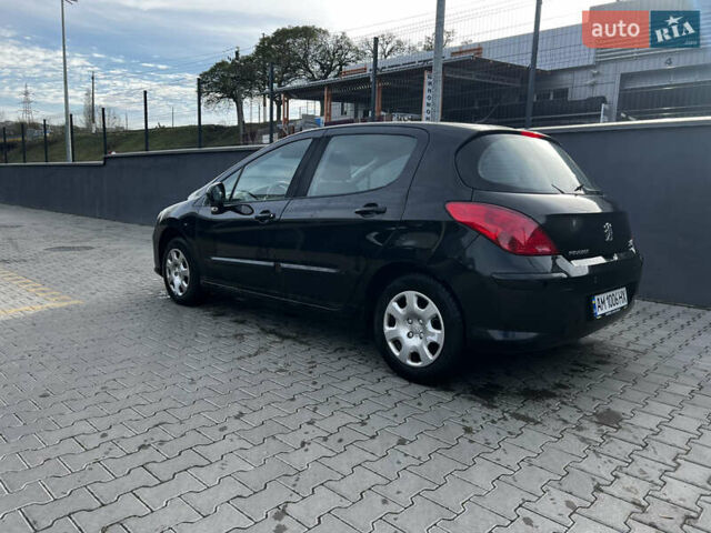 Черный Пежо 308, объемом двигателя 1.6 л и пробегом 260 тыс. км за 4600 $, фото 5 на Automoto.ua
