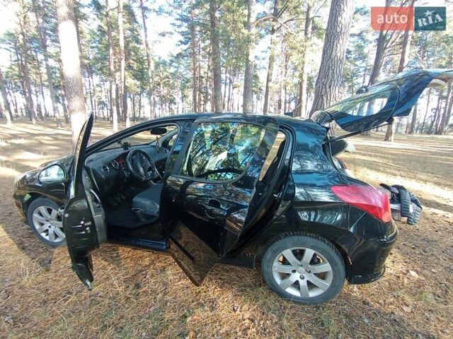 Черный Пежо 308, объемом двигателя 1.6 л и пробегом 335 тыс. км за 4900 $, фото 15 на Automoto.ua