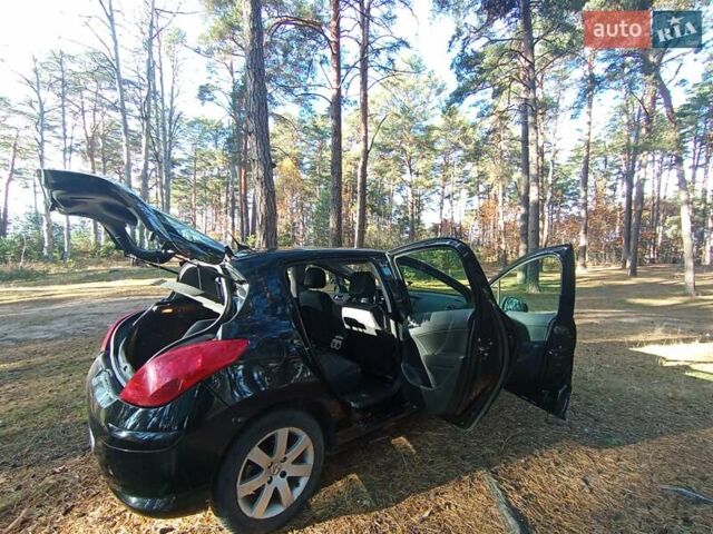 Черный Пежо 308, объемом двигателя 1.6 л и пробегом 335 тыс. км за 4900 $, фото 14 на Automoto.ua