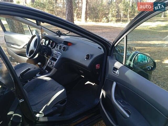 Черный Пежо 308, объемом двигателя 1.6 л и пробегом 335 тыс. км за 4900 $, фото 5 на Automoto.ua