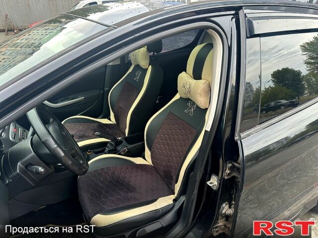 Черный Пежо 308, объемом двигателя 1.6 л и пробегом 226 тыс. км за 5500 $, фото 5 на Automoto.ua