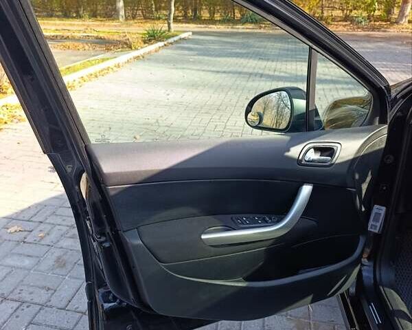 Черный Пежо 308, объемом двигателя 1.6 л и пробегом 185 тыс. км за 4900 $, фото 18 на Automoto.ua