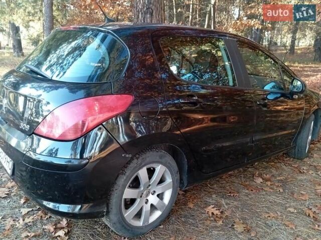 Черный Пежо 308, объемом двигателя 1.6 л и пробегом 335 тыс. км за 4900 $, фото 3 на Automoto.ua