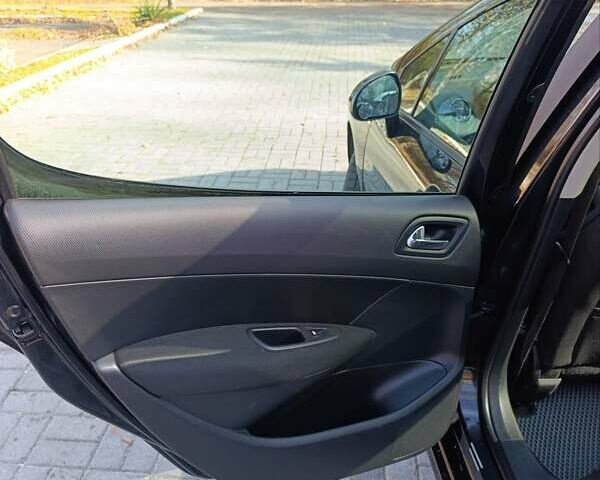 Черный Пежо 308, объемом двигателя 1.6 л и пробегом 185 тыс. км за 4900 $, фото 22 на Automoto.ua