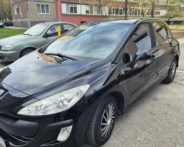Черный Пежо 308, объемом двигателя 1.6 л и пробегом 142 тыс. км за 4300 $, фото 6 на Automoto.ua