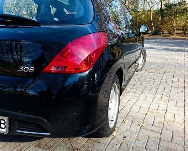 Черный Пежо 308, объемом двигателя 1.6 л и пробегом 185 тыс. км за 4900 $, фото 14 на Automoto.ua