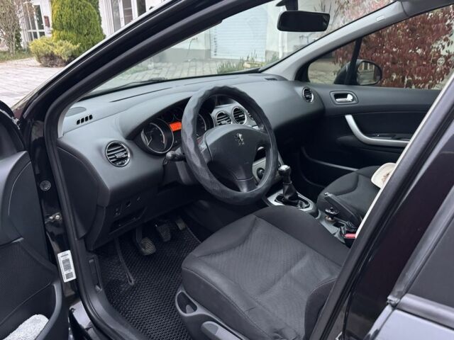 Черный Пежо 308, объемом двигателя 1.6 л и пробегом 157 тыс. км за 5200 $, фото 9 на Automoto.ua