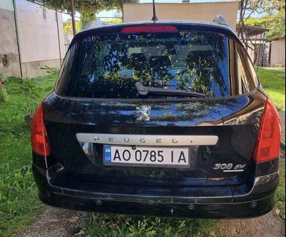 Чорний Пежо 308, об'ємом двигуна 2 л та пробігом 180 тис. км за 6500 $, фото 1 на Automoto.ua