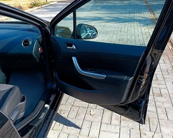 Черный Пежо 308, объемом двигателя 1.6 л и пробегом 185 тыс. км за 4900 $, фото 26 на Automoto.ua