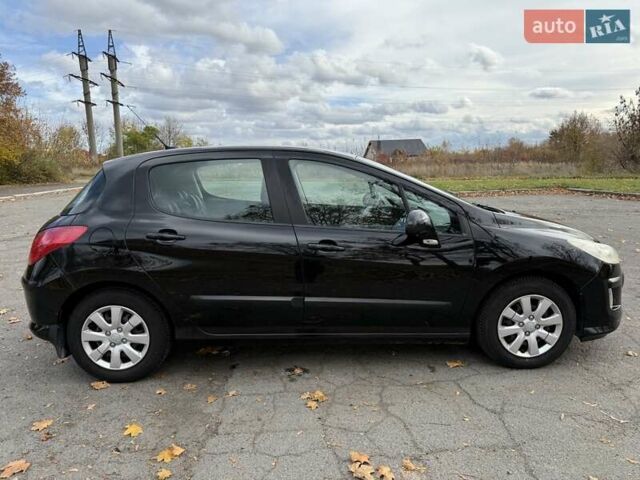 Черный Пежо 308, объемом двигателя 1.56 л и пробегом 320 тыс. км за 5300 $, фото 6 на Automoto.ua