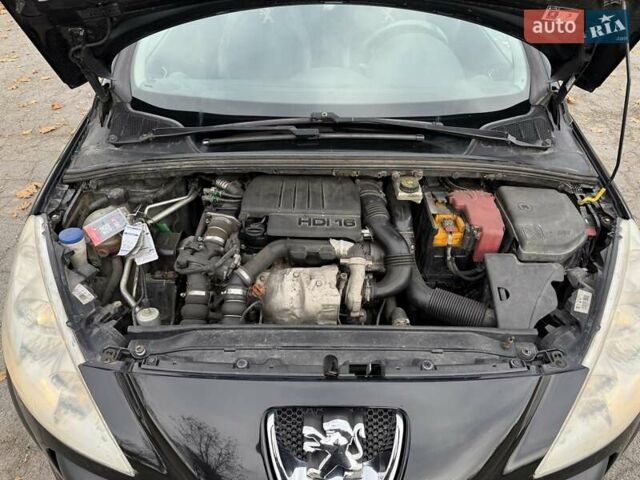 Черный Пежо 308, объемом двигателя 1.56 л и пробегом 320 тыс. км за 5300 $, фото 9 на Automoto.ua