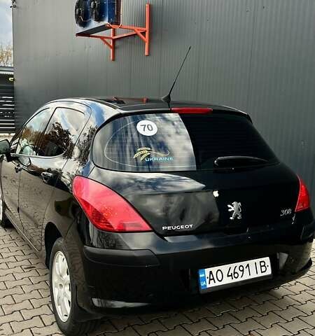 Чорний Пежо 308, об'ємом двигуна 1.6 л та пробігом 183 тис. км за 5000 $, фото 4 на Automoto.ua