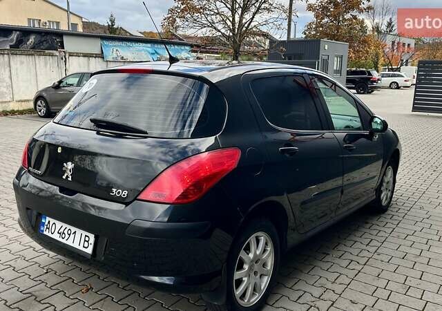 Чорний Пежо 308, об'ємом двигуна 1.6 л та пробігом 183 тис. км за 5000 $, фото 3 на Automoto.ua