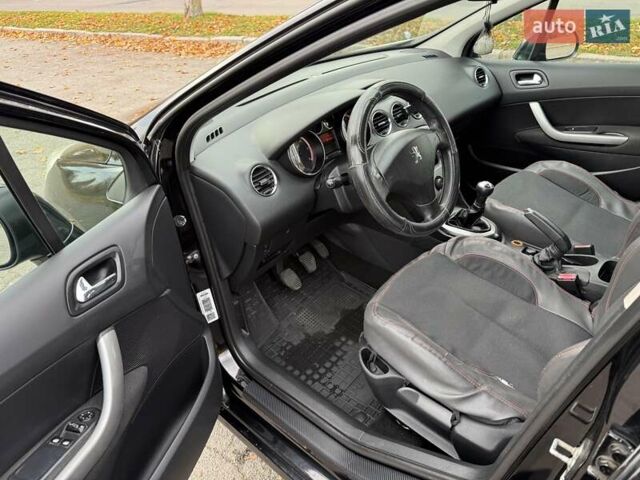 Черный Пежо 308, объемом двигателя 1.56 л и пробегом 320 тыс. км за 5300 $, фото 13 на Automoto.ua