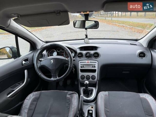 Черный Пежо 308, объемом двигателя 1.56 л и пробегом 320 тыс. км за 5300 $, фото 14 на Automoto.ua