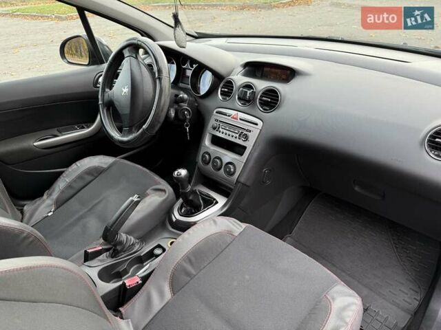 Черный Пежо 308, объемом двигателя 1.56 л и пробегом 320 тыс. км за 5300 $, фото 10 на Automoto.ua