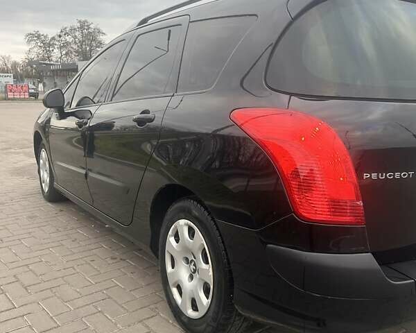 Черный Пежо 308, объемом двигателя 1.6 л и пробегом 292 тыс. км за 6200 $, фото 14 на Automoto.ua