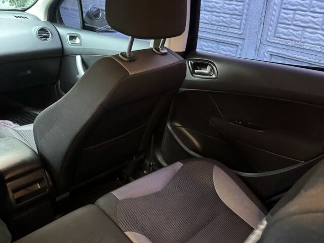 Чорний Пежо 308, об'ємом двигуна 1.6 л та пробігом 233 тис. км за 3800 $, фото 11 на Automoto.ua