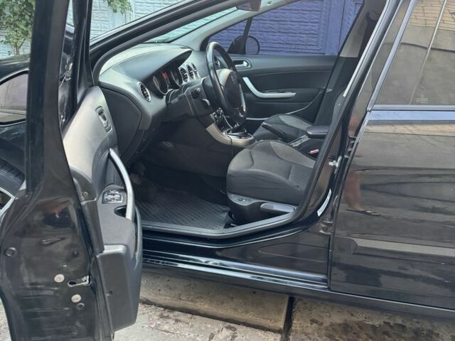 Чорний Пежо 308, об'ємом двигуна 1.6 л та пробігом 233 тис. км за 3800 $, фото 7 на Automoto.ua