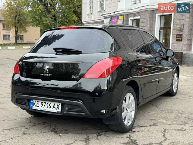 Чорний Пежо 308, об'ємом двигуна 1.6 л та пробігом 160 тис. км за 7300 $, фото 7 на Automoto.ua