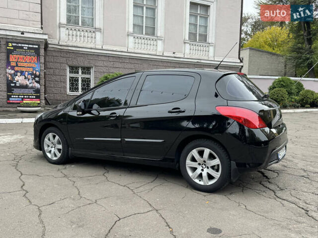 Чорний Пежо 308, об'ємом двигуна 1.6 л та пробігом 160 тис. км за 7300 $, фото 4 на Automoto.ua