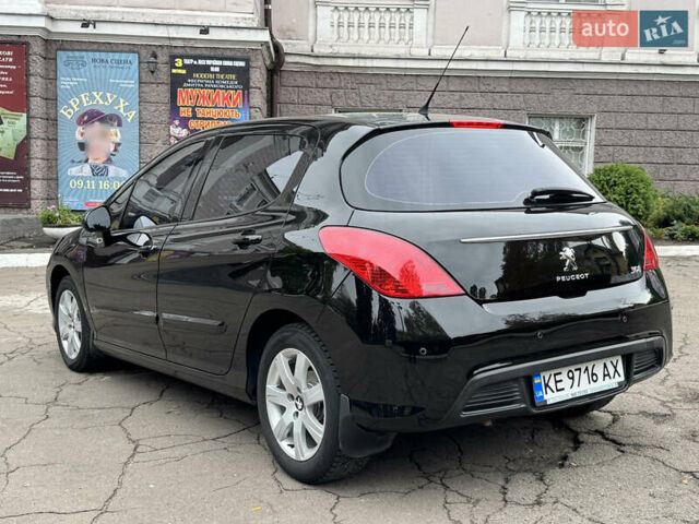 Чорний Пежо 308, об'ємом двигуна 1.6 л та пробігом 160 тис. км за 7300 $, фото 5 на Automoto.ua