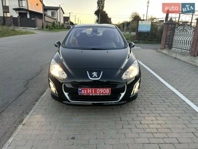 Черный Пежо 308, объемом двигателя 1.6 л и пробегом 145 тыс. км за 7400 $, фото 1 на Automoto.ua